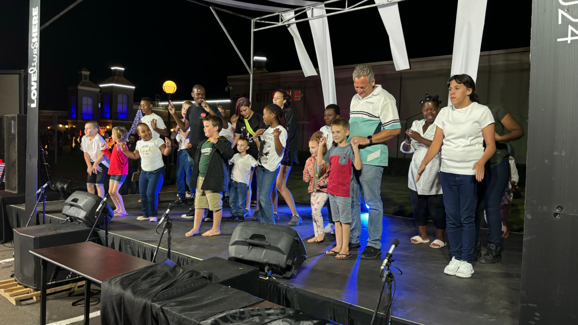 Kids performing on the Night Market stage